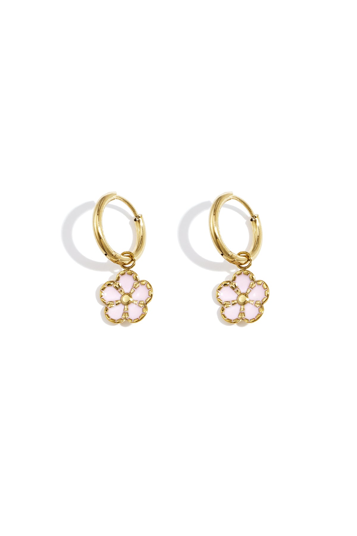 Pair of gold hoop earrings with delicate pink enamel flower charms displayed on a white background