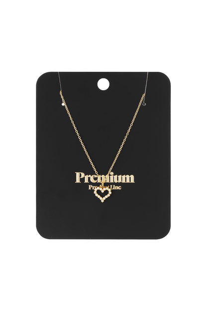 Gold-tone chain necklace with a small heart-shaped pendant outlined in clear, sparkling rhinestones.