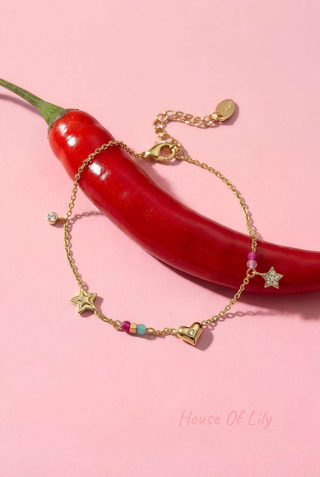 Charm bracelet with heart, star, stones and beads