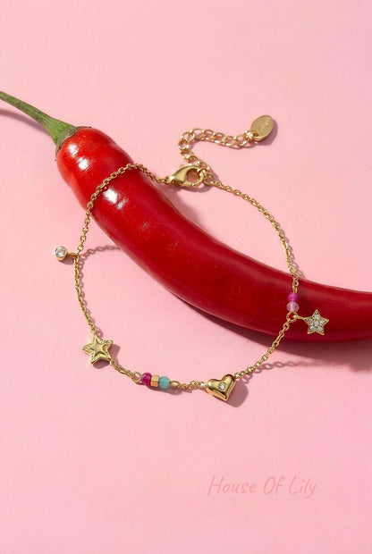 Charm bracelet with heart, star, stones and beads