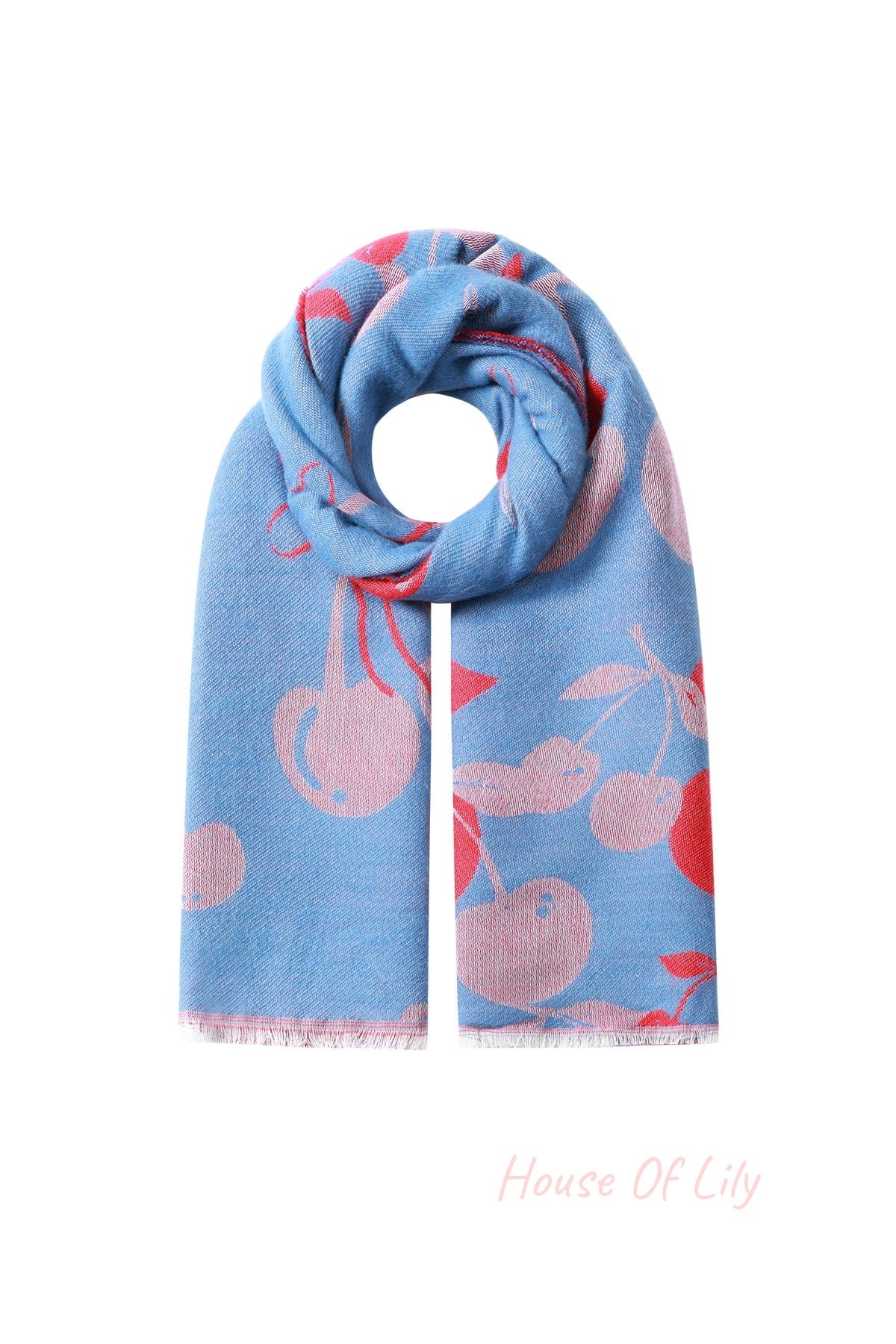 Folded blue and red cherry print scarf with fringed edges on white background