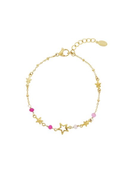 Gold star charm bracelet with pink and white beads laid flat showing lobster clasp and extender chain