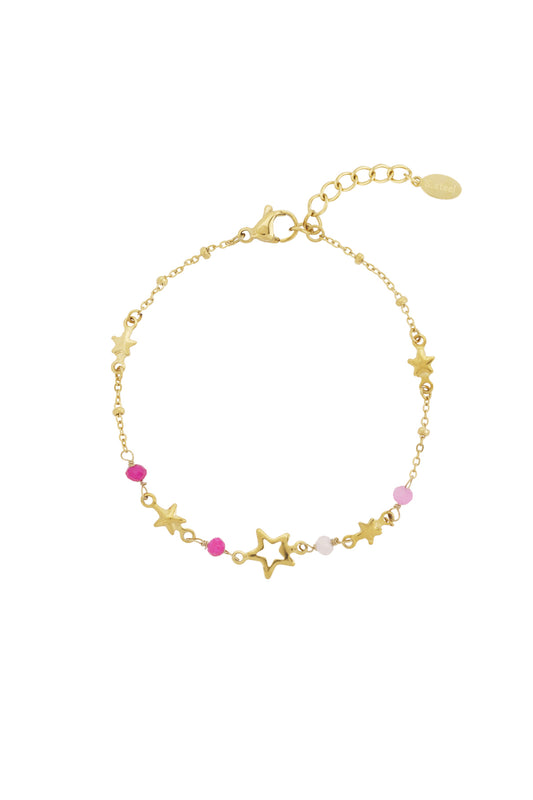 Gold star charm bracelet with pink and white beads laid flat showing lobster clasp and extender chain