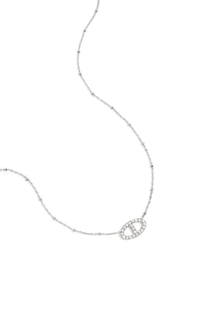 Elegant silver pendant necklace with crystal-studded oval charm and beaded chain detail shown on white background