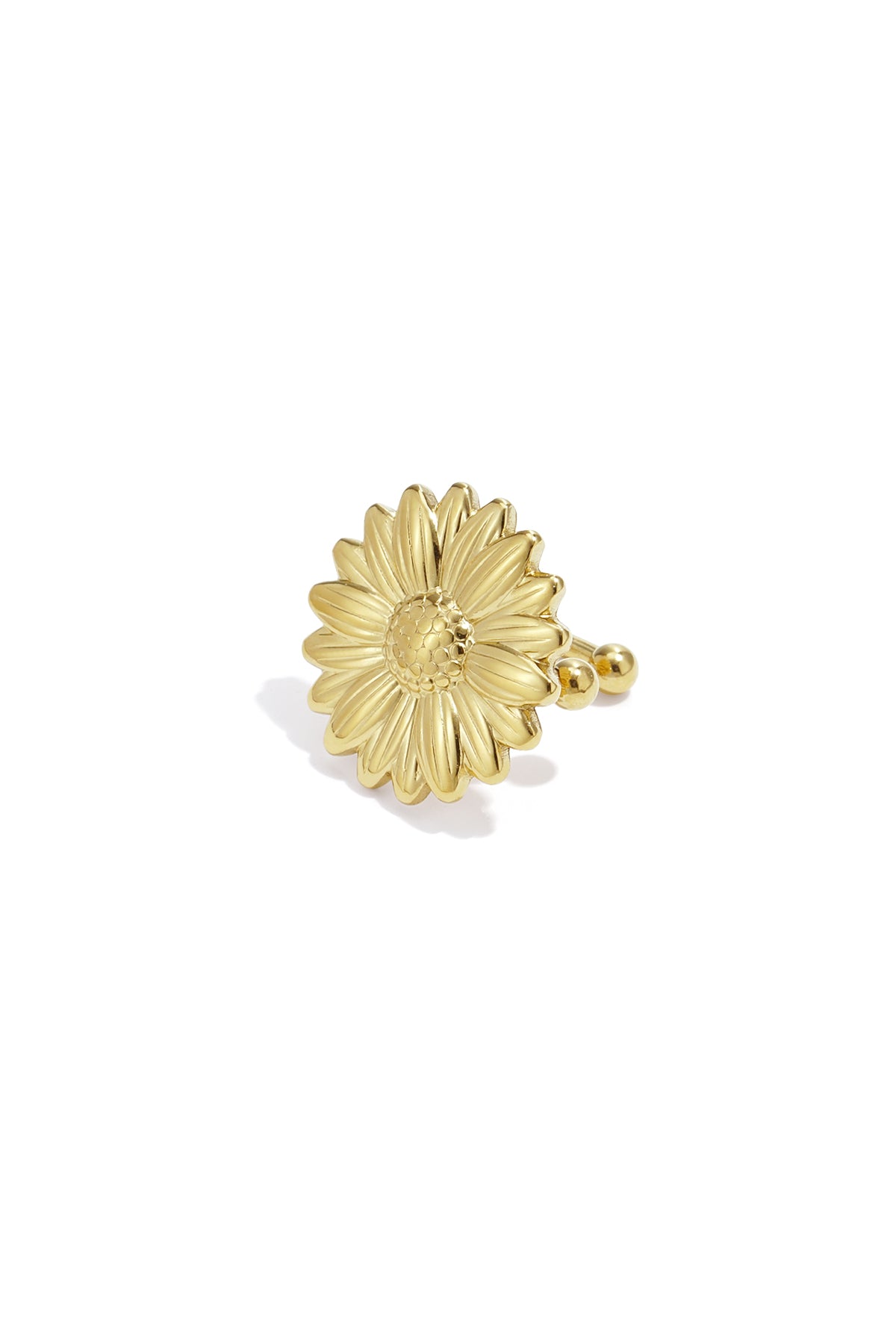 Close-up gold-tone stainless steel flower-shaped ear cuff on white background