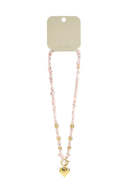Soft Girl Heart necklace: Pink textured fabric cord with gold-tone beads and a gold heart pendant on a toggle clasp.