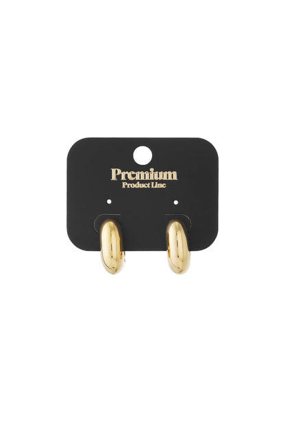 Glazed Puffy Loop earrings in shiny gold, featuring a smooth, thick, rounded minimalist hoop design on a display card.
