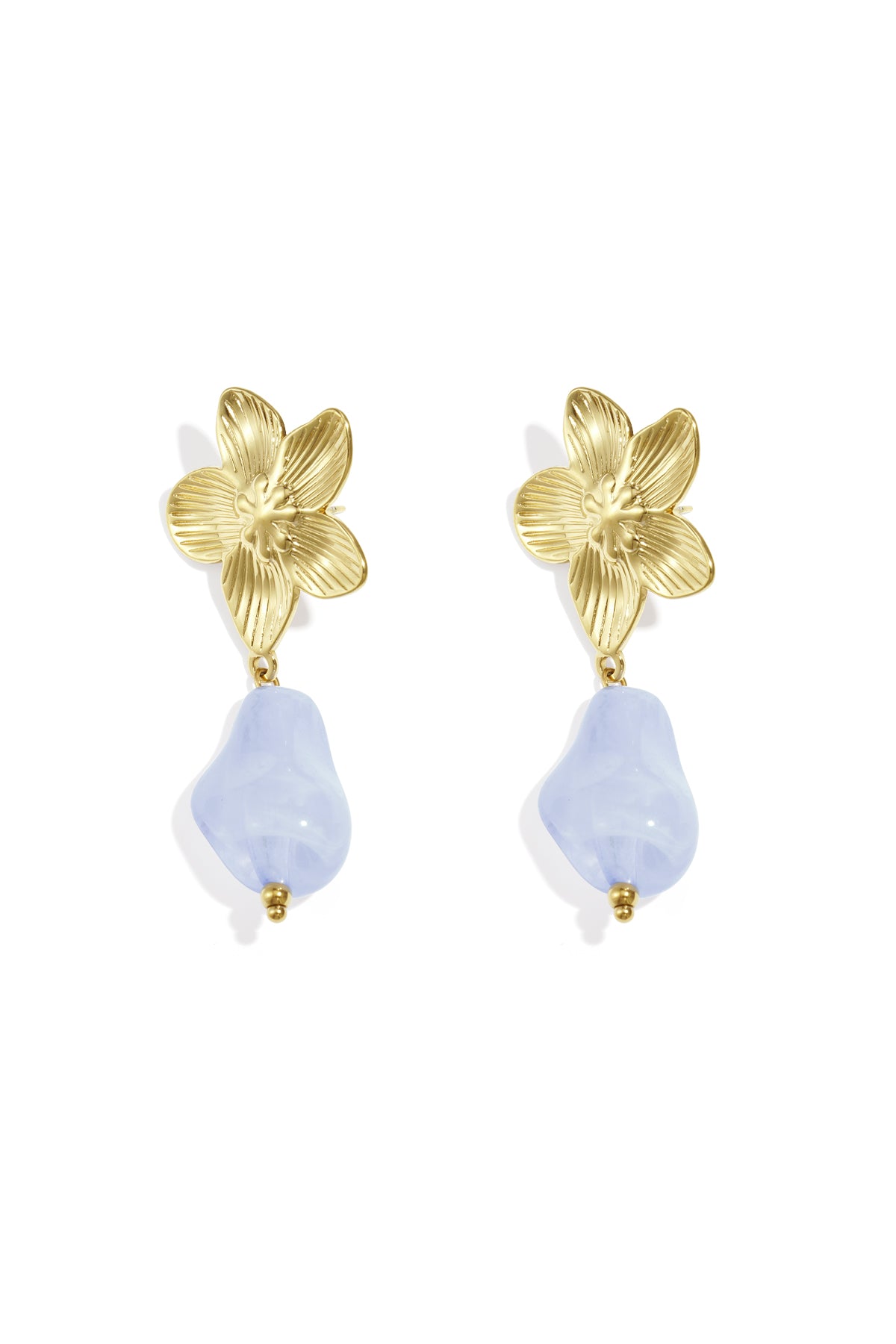 Pair of gold-tone flower drop earrings with bright amber organic acrylic bead on white background