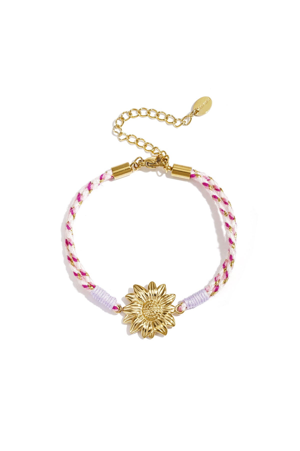 Close-up of turquoise braided rope bracelet with gold starfish charm on white background