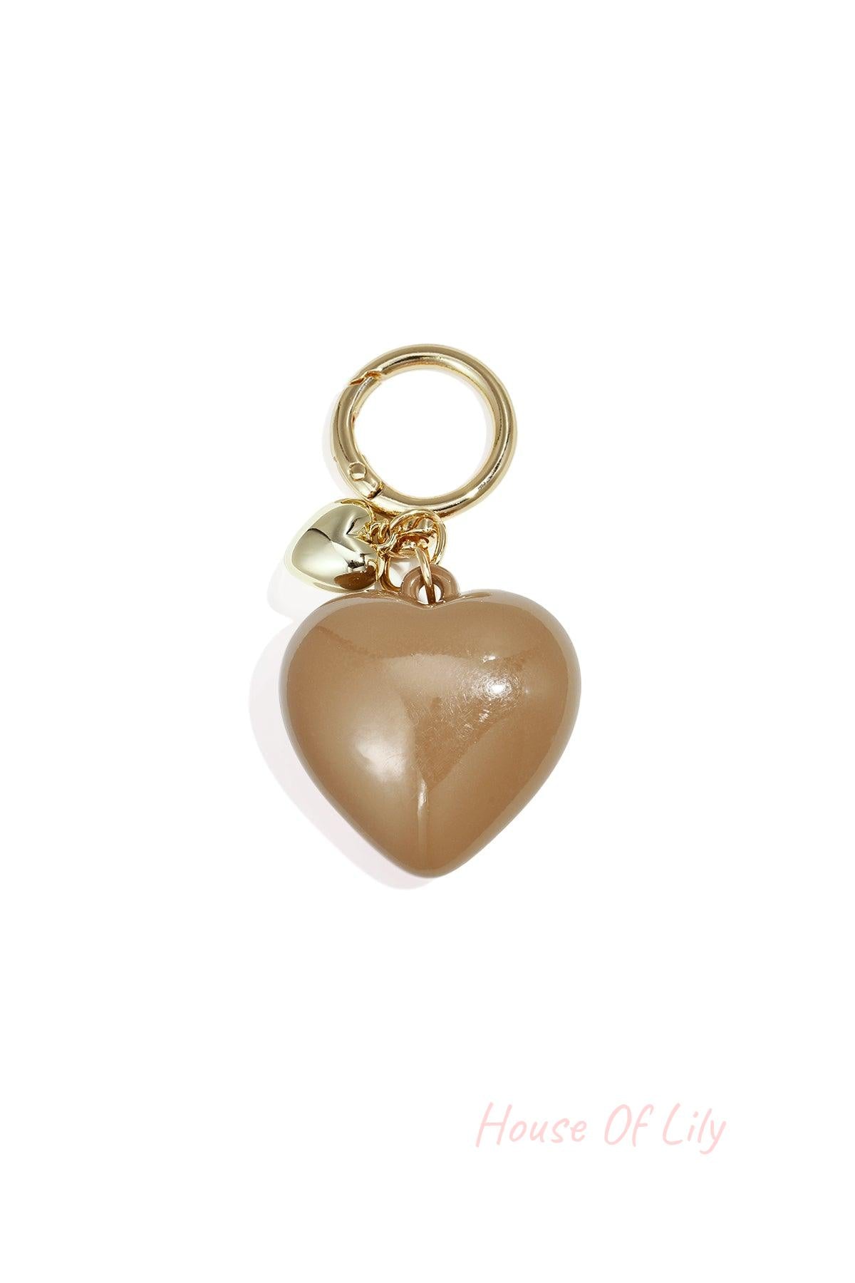 Glossy warm taupe heart-shaped acrylic bag charm with gold alloy ring and tiny heart charm