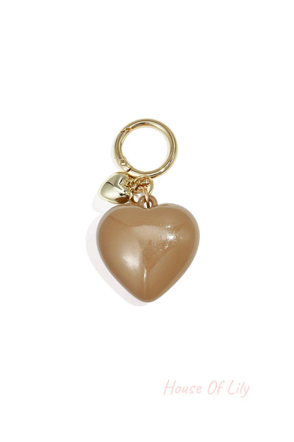 Glossy warm taupe heart-shaped acrylic bag charm with gold alloy ring and tiny heart charm