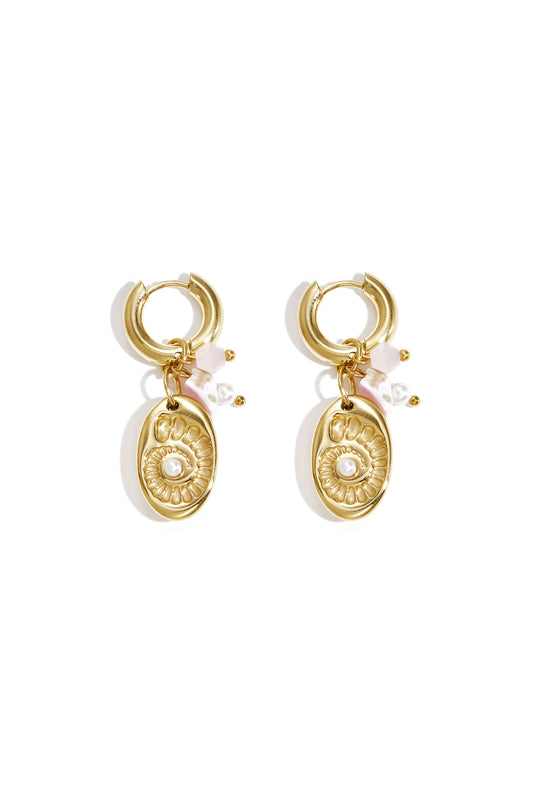 Pair of gold-tone drop earrings with a shell medallion charm and pink bead accents on white background