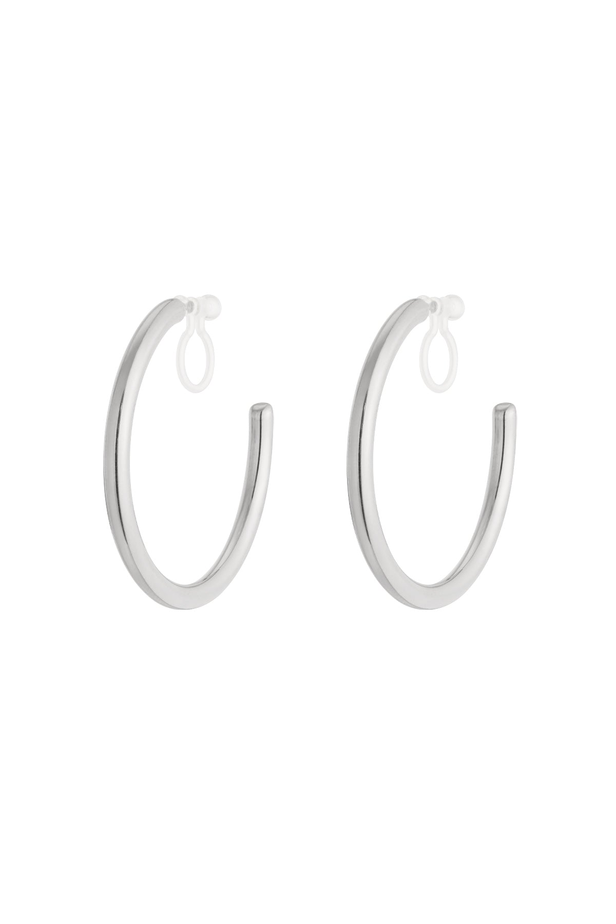Pair of polished silver-tone clip-on hoop earrings with clear silicone loops on white background