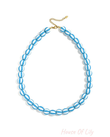 Bead necklace with striped beads