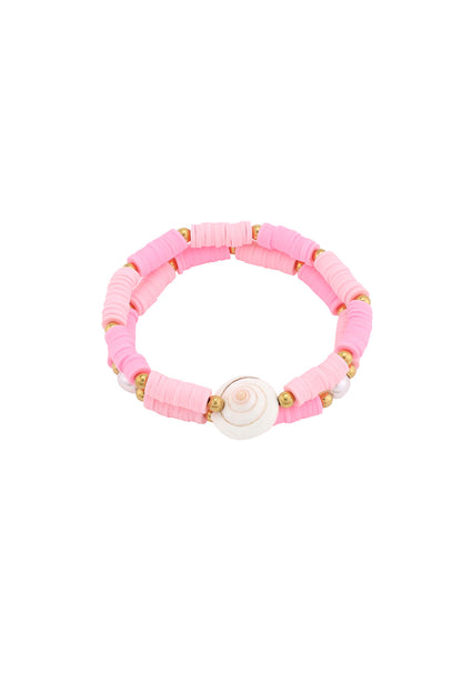 Pink shell charm beaded bracelet with gold-tone and polymer clay beads on white background