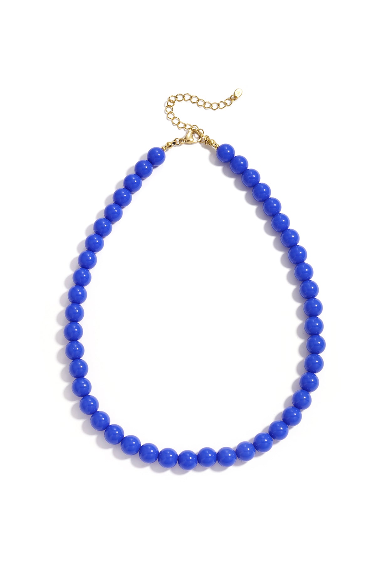 A vibrant blue resin beaded necklace with a gold-tone chain clasp on a white background.