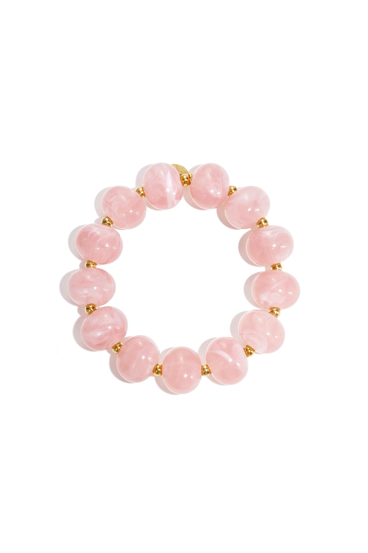 Light pink marbled beaded stretch bracelet with gold spacer beads on white background