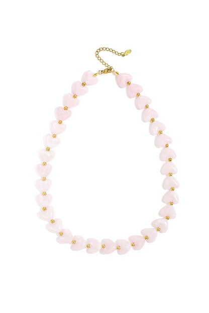 Heart Beaded Necklace with light pink heart-shaped beads separated by small gold beads on a gold chain.