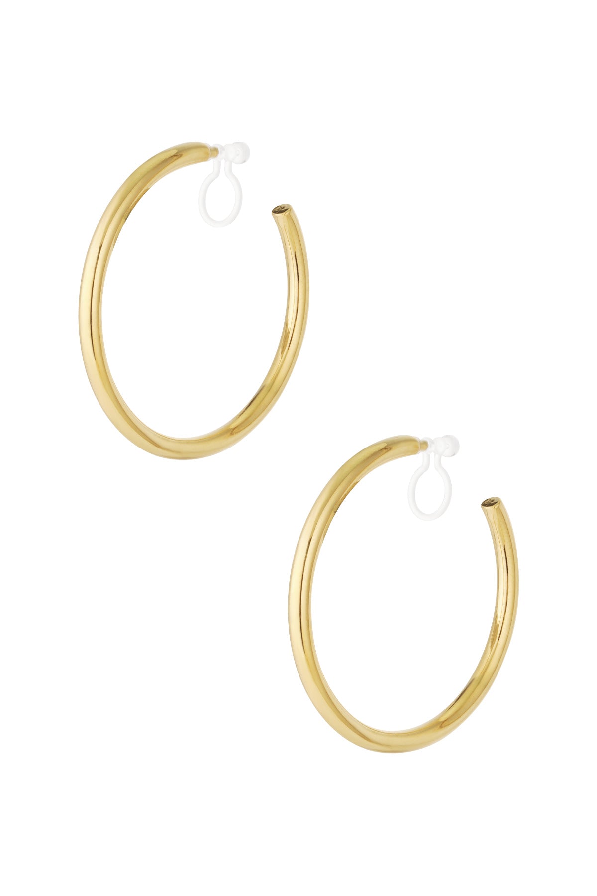 Pair of classic minimal gold clip-on hoop earrings isolated on white background