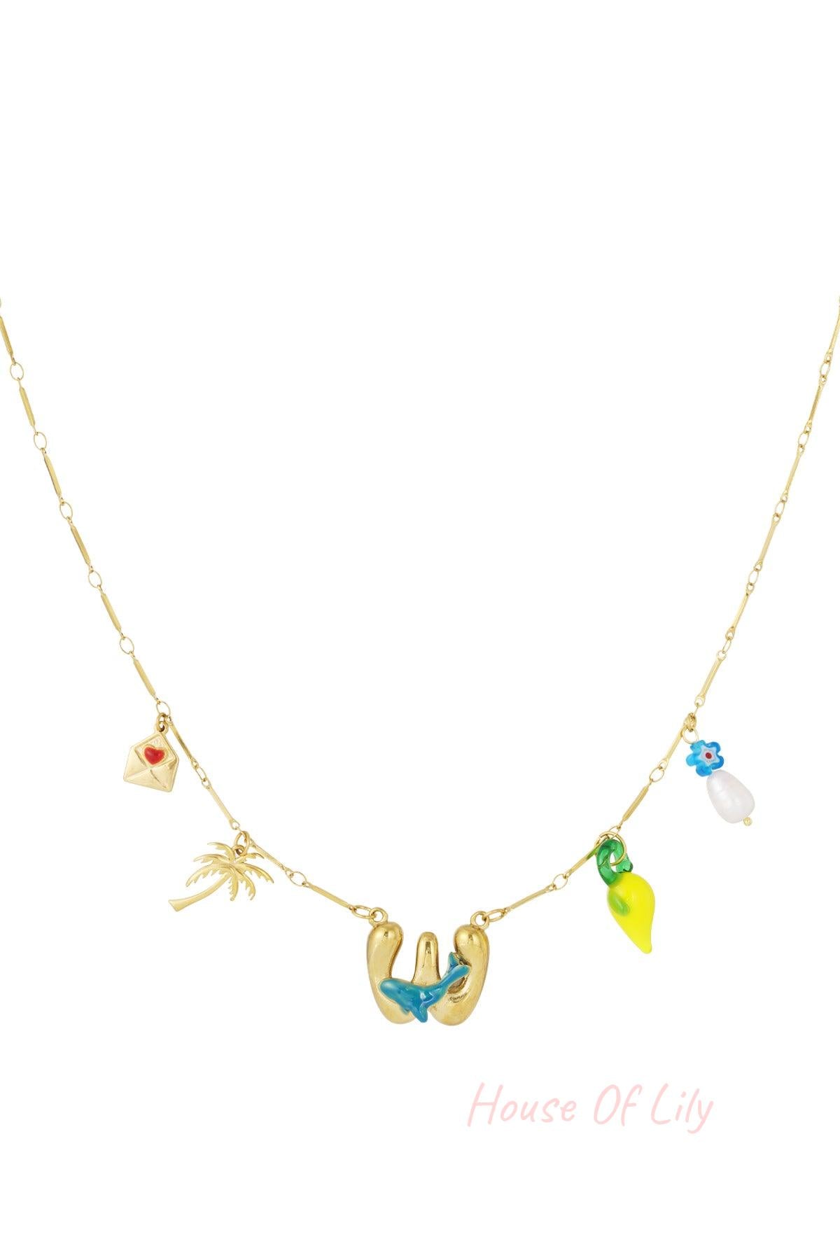 Gold chain necklace with 'W' initial pendant and colorful charms including a palm tree, envelope, lemon, and flower.