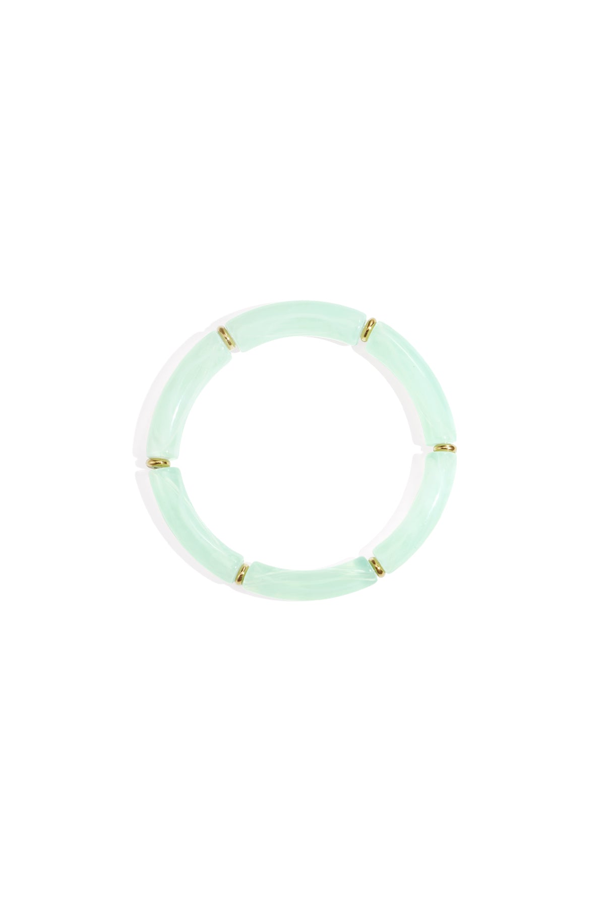 Mint green resin tube bracelet with gold-tone ring spacers displayed on white background