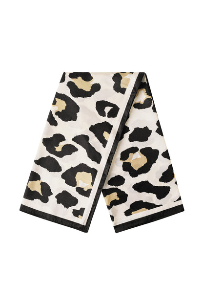 Beige and black leopard print silk scarf with smooth texture and black border folded
