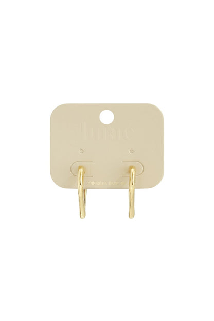 Dainty Heart Core Hoops: Small, gold-toned hoop earrings with a subtle, irregular heart-shaped design on a display card.