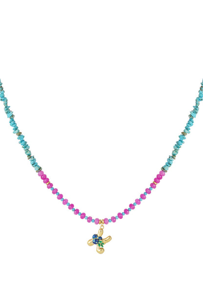 Beaded necklace featuring turquoise chips, pink beads, and a gold-tone initial charm with blue and green accents.