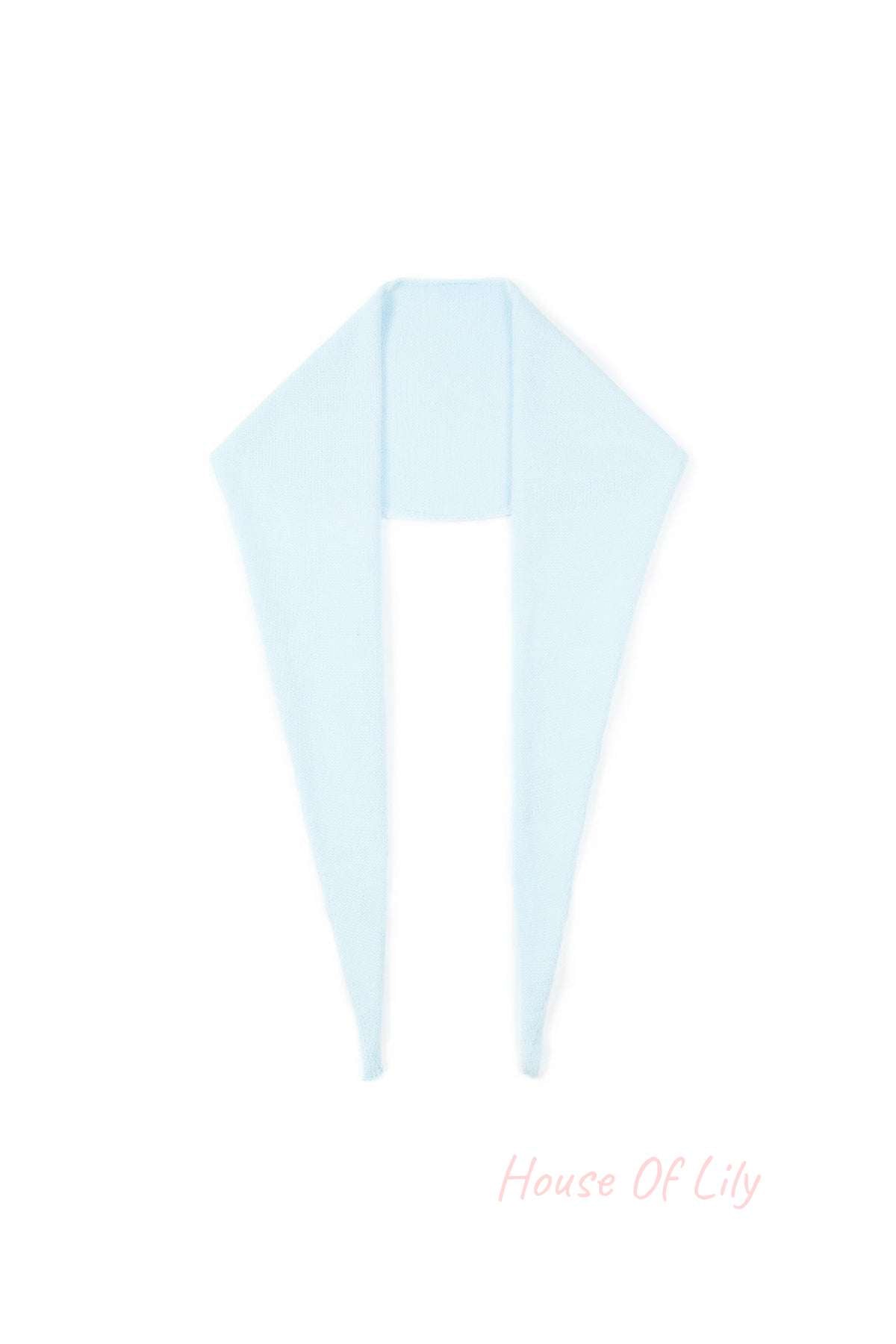 Baby blue soft knit triangle scarf laid flat
