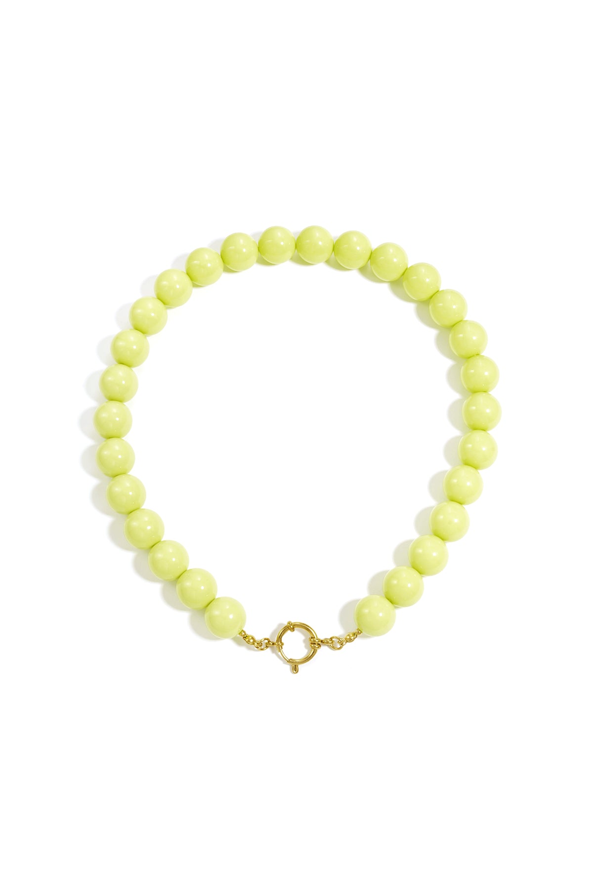 Chunky lime green resin bead necklace with a gold-tone circular front clasp, isolated on a white background.