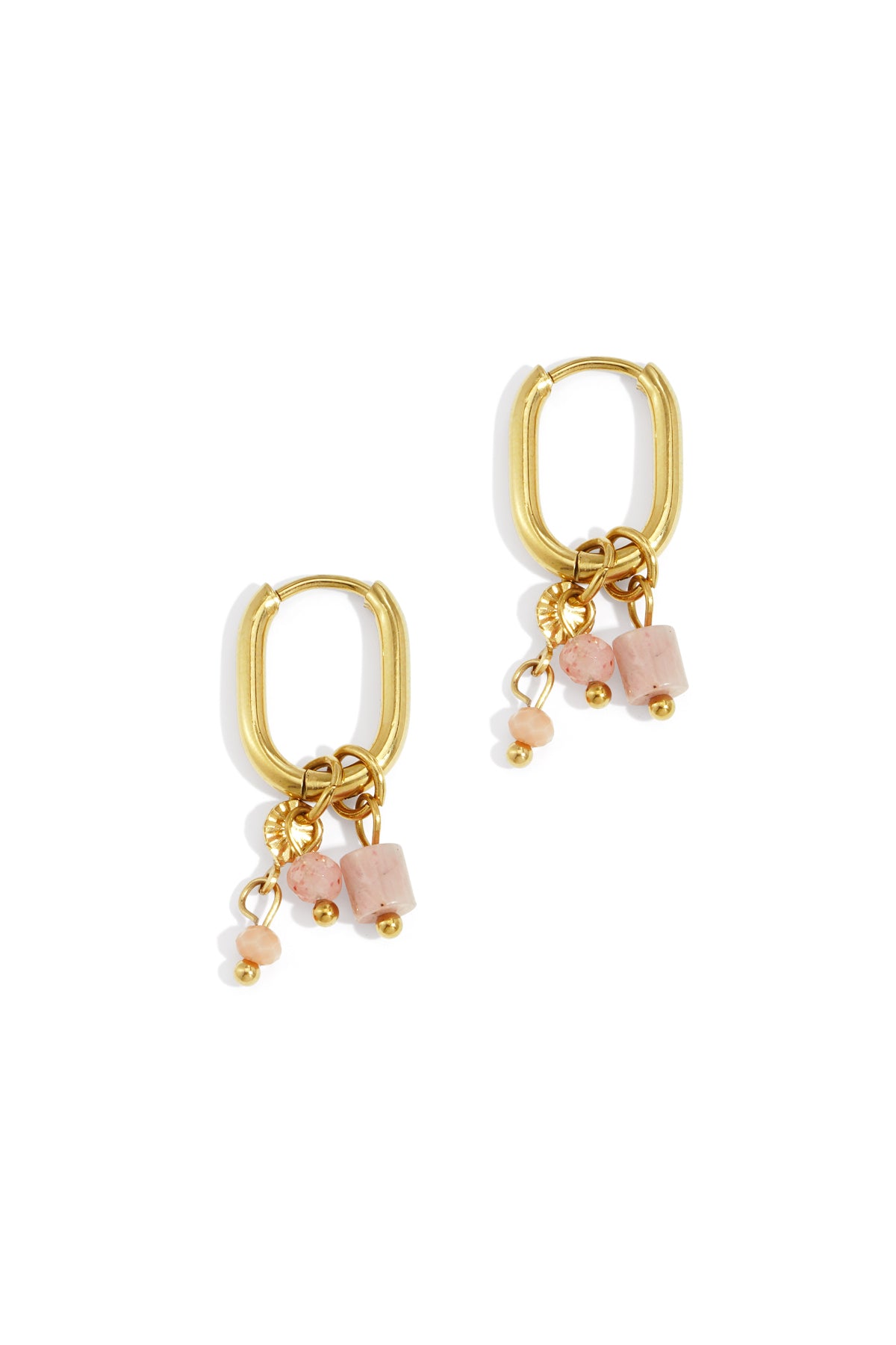 Close up shot of gold rectangular hoop earrings adorned with soft pink stone charms and gold beads on white background