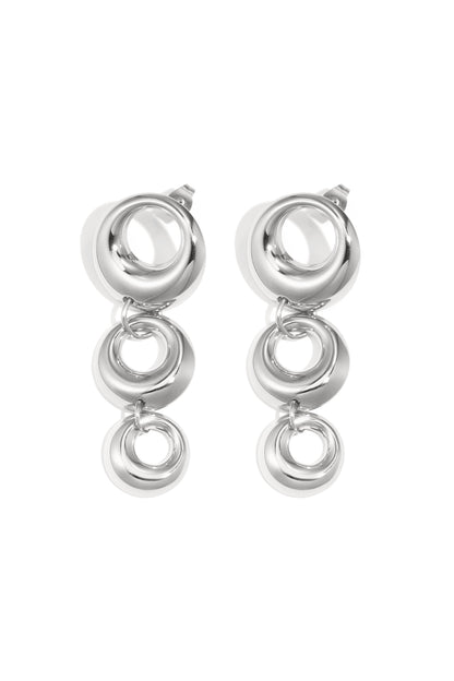 Pair of chunky linked circle dangle earrings in glossy silver tone on white background