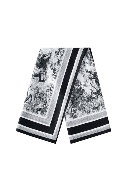 Folded black and white polyester scarf with scenic and striped print