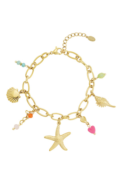 Gold-tone chain bracelet with starfish, seashell, conch shell charms and colorful beads on a white background