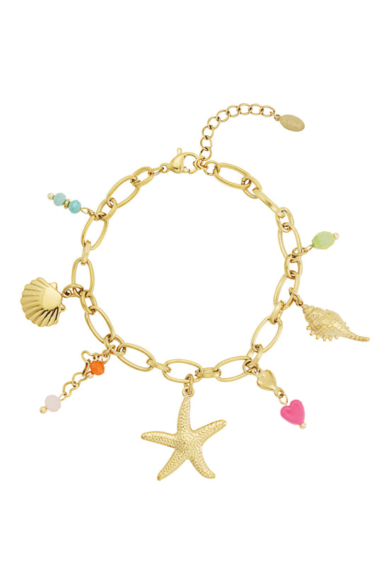 Gold-tone chain bracelet with starfish, seashell, conch shell charms and colorful beads on a white background