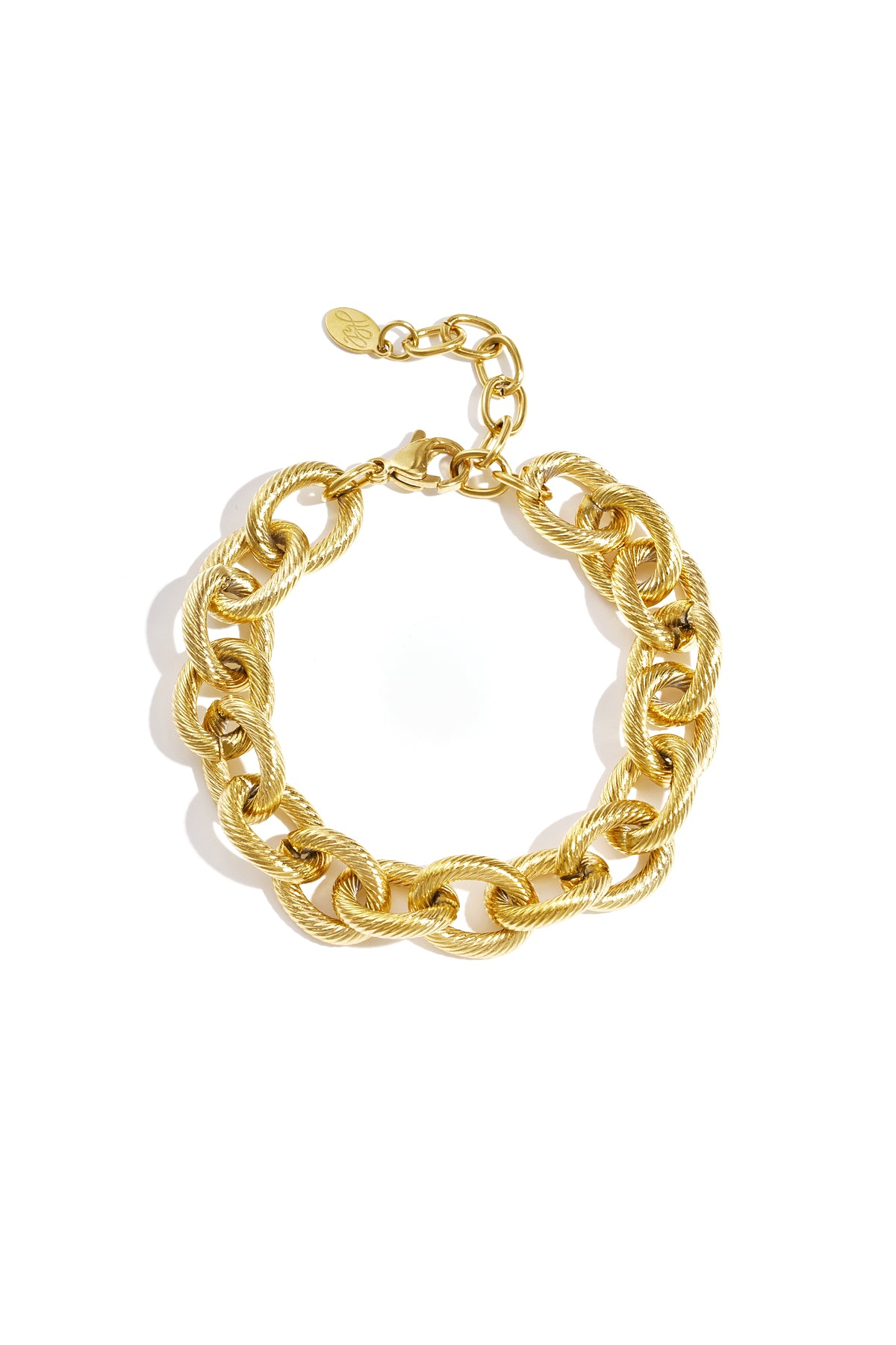 Gold twisted link chain bracelet laid flat showing lobster clasp and extender chain