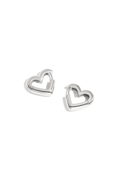Simple silver heart-shaped hoop earrings shown as pairs on white background