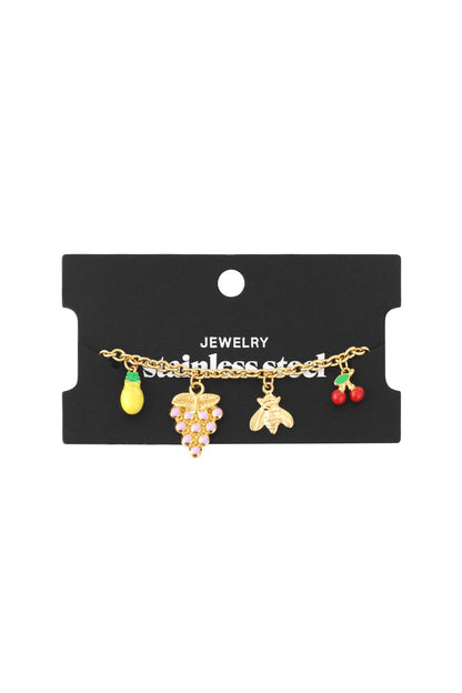 Gold-tone stainless steel chain bracelet featuring vibrant enamel charms of a pineapple, grapes, bee, and cherries.