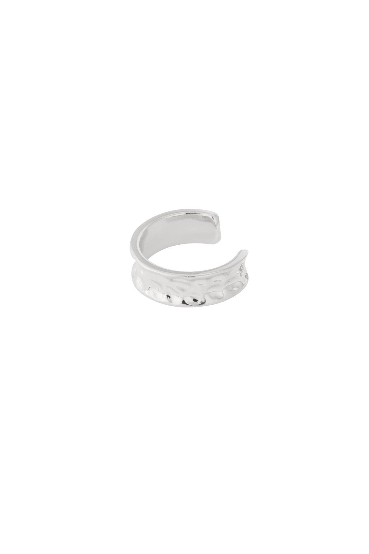 Single close-up image of a silver hammered metal ear cuff on a white background