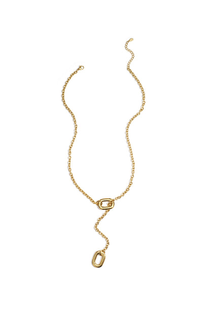 Gold Y-shaped chain necklace with smooth, rounded rectangular links laid flat on a white background