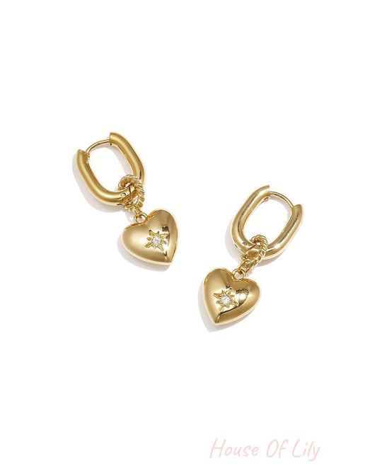 Squoval earrings with heart pendant and stone