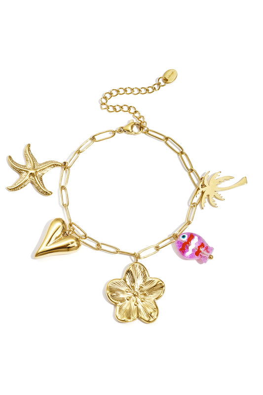 Gold link charm bracelet with starfish, heart, flower, palm tree, and colorful fish charms on white background
