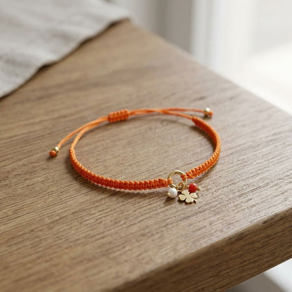 Close-up of the braided polyester texture on the Charm Party Stack bracelet, emphasizing its delicate weave and petite size.