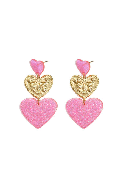 Statement earrings with glitter hearts