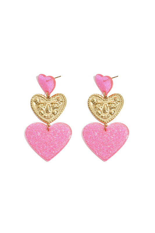 Statement earrings with glitter hearts