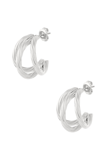 Pair of silver twisted hoop earrings with intertwined strands displayed on white background
