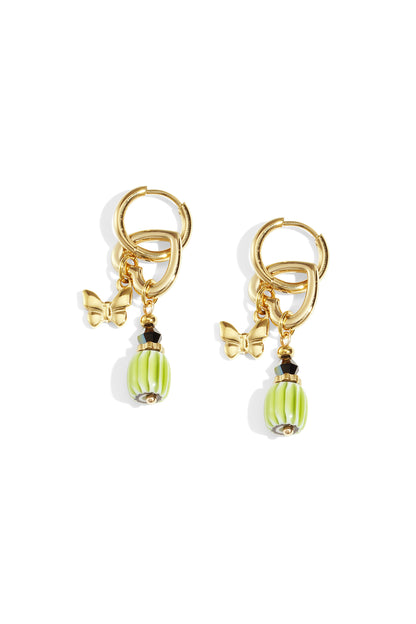 Pair of gold-tone butterfly charm drop earrings with green ribbed beads and black accent beads on white background