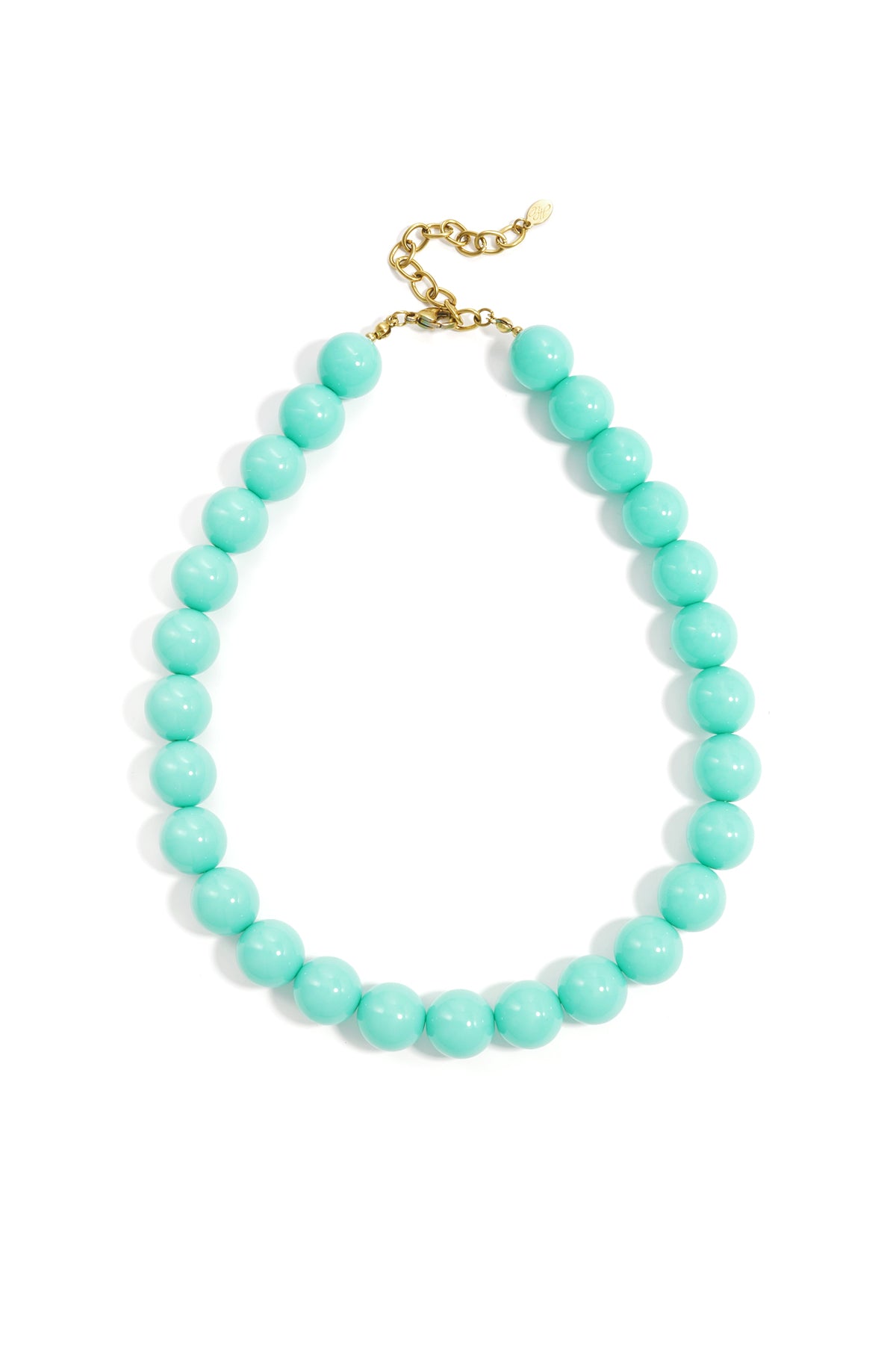 Chunky necklace featuring vibrant turquoise beads and a gold-tone metal clasp, isolated on a white background.
