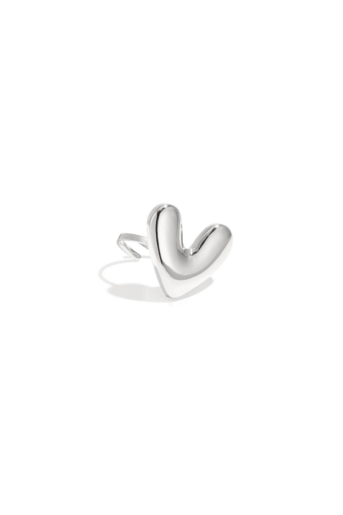 Silver chubby heart-shaped statement ring with smooth curved design on white background