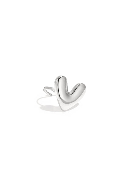 Silver chubby heart-shaped statement ring with smooth curved design on white background